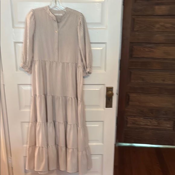 Karlie Dresses & Skirts - Karlie brown seersucker
Tiered Ruffled dress with Bishop Sleeves